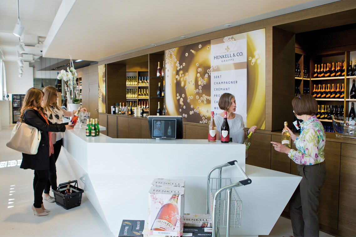 Sparkling wine tasting at the store counter