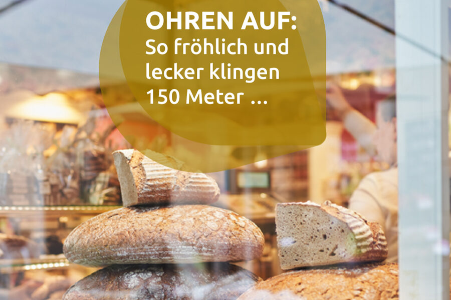 Wiesbaden im Ohr: Schaufenster mit frischem Brot und Slogan.